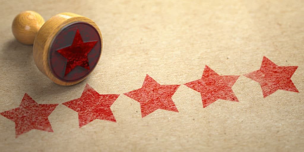 Five stars printed on craft paper with stamp.