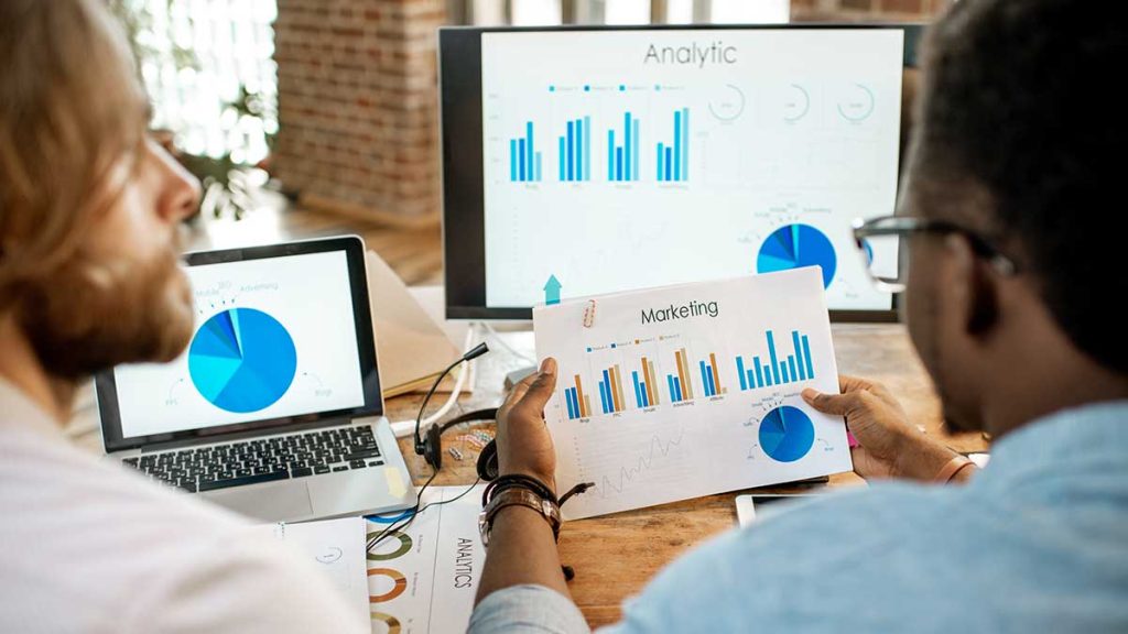 coworkers-working-together-with-analytics-5313678