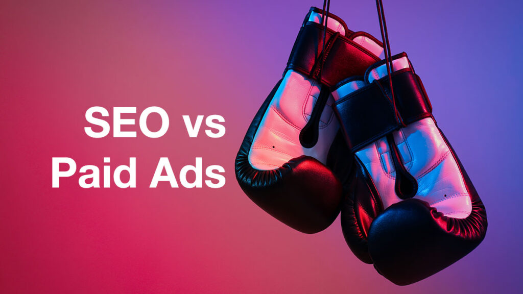 Image of boxing gloves and the words SEO vs Paid Ads.